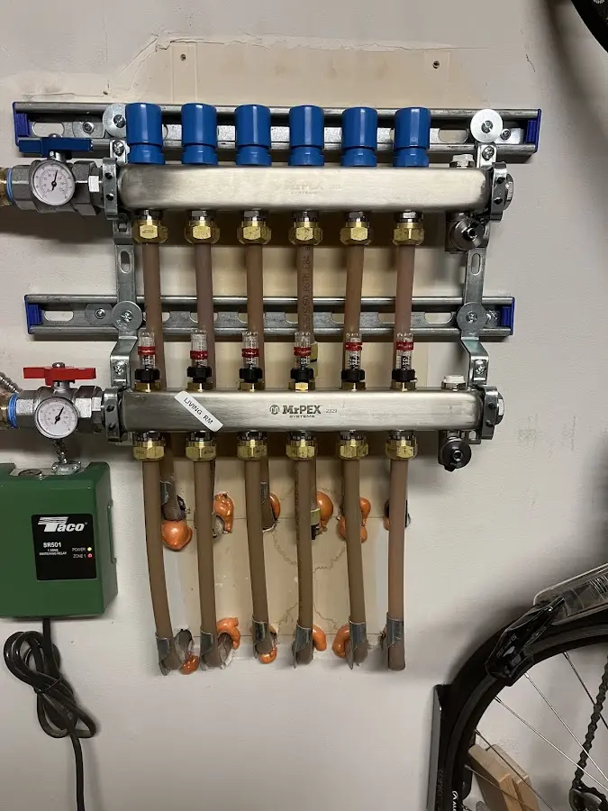 Plumber performing Gas Line Installation at a residential property in Keyser